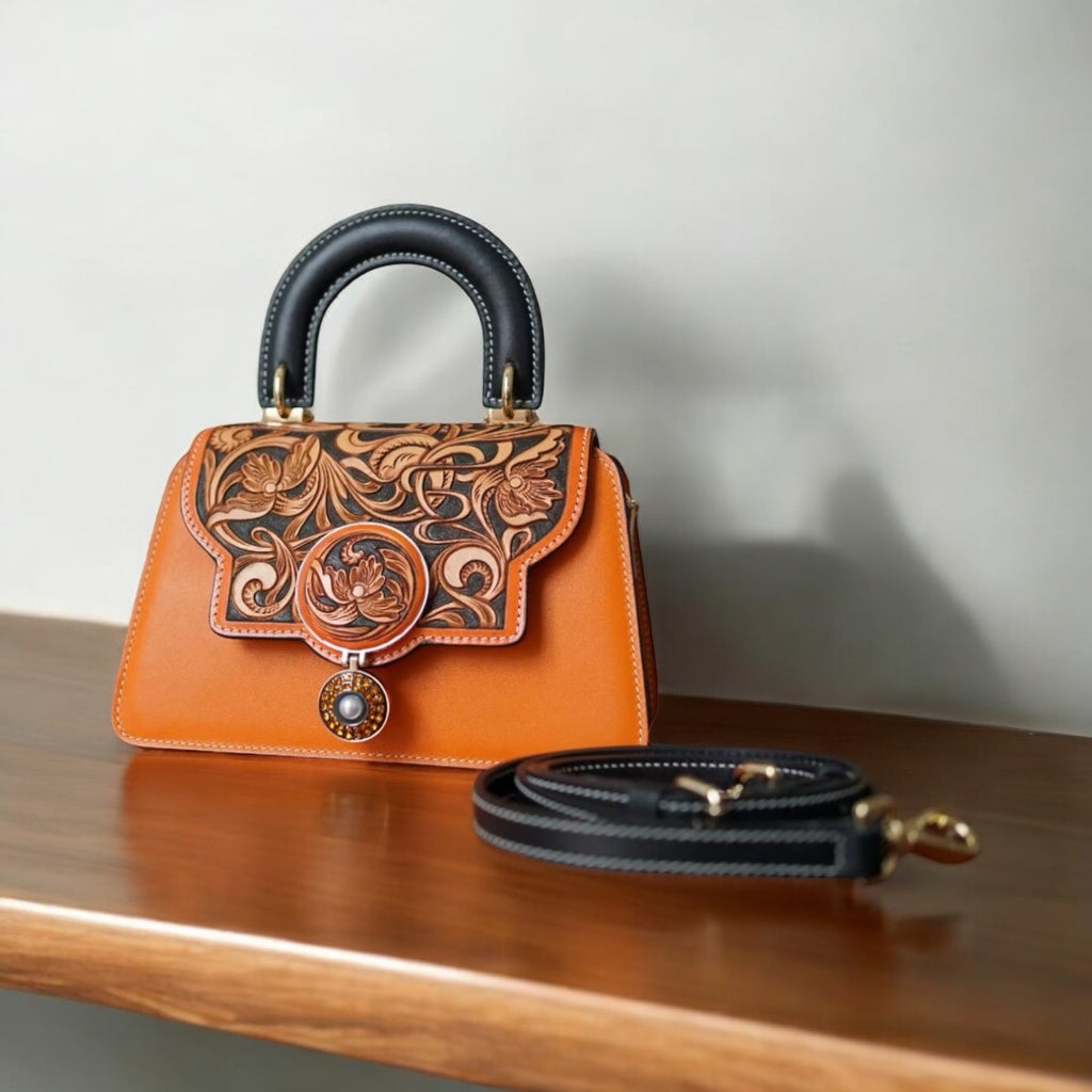 Sac Grace orange en cuir sculpté embossé floral avec bandoulière – Maison La Reine 