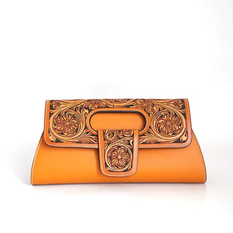 Sac pochette Kima orange en cuir sculpté – vue de face