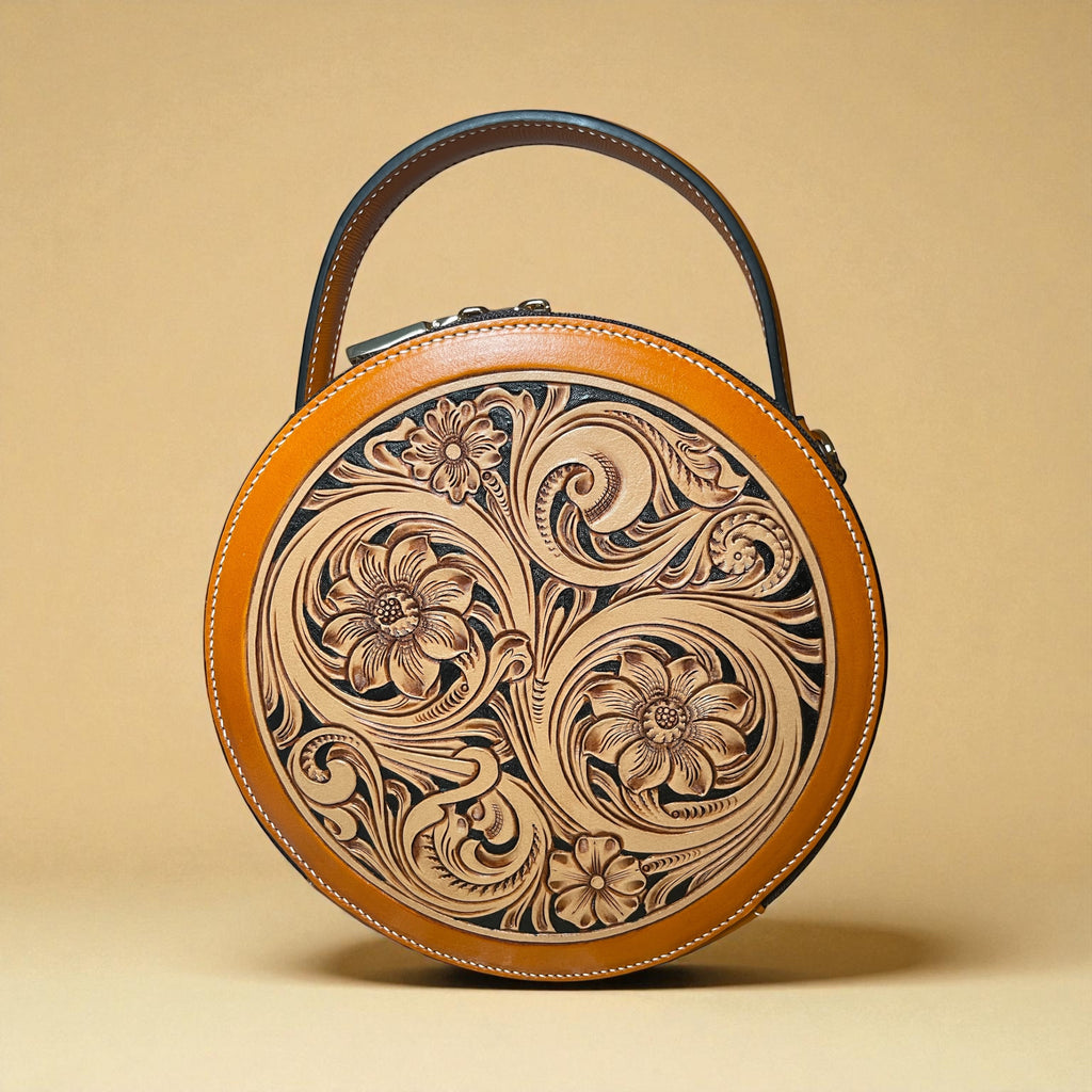 Sac rond Nicky orange en cuir embossé, vue avant – Maison La Reine”