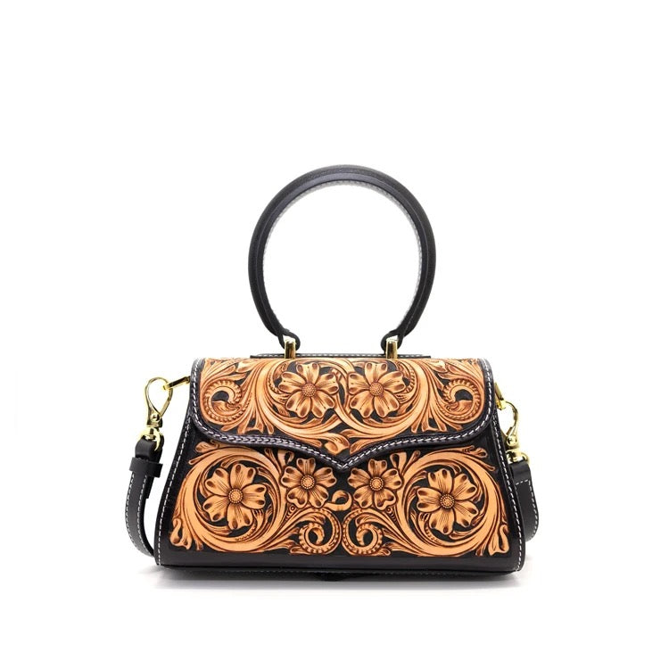 Sac Sabine noir en cuir gravé floral, vue de face – Maison La Reine